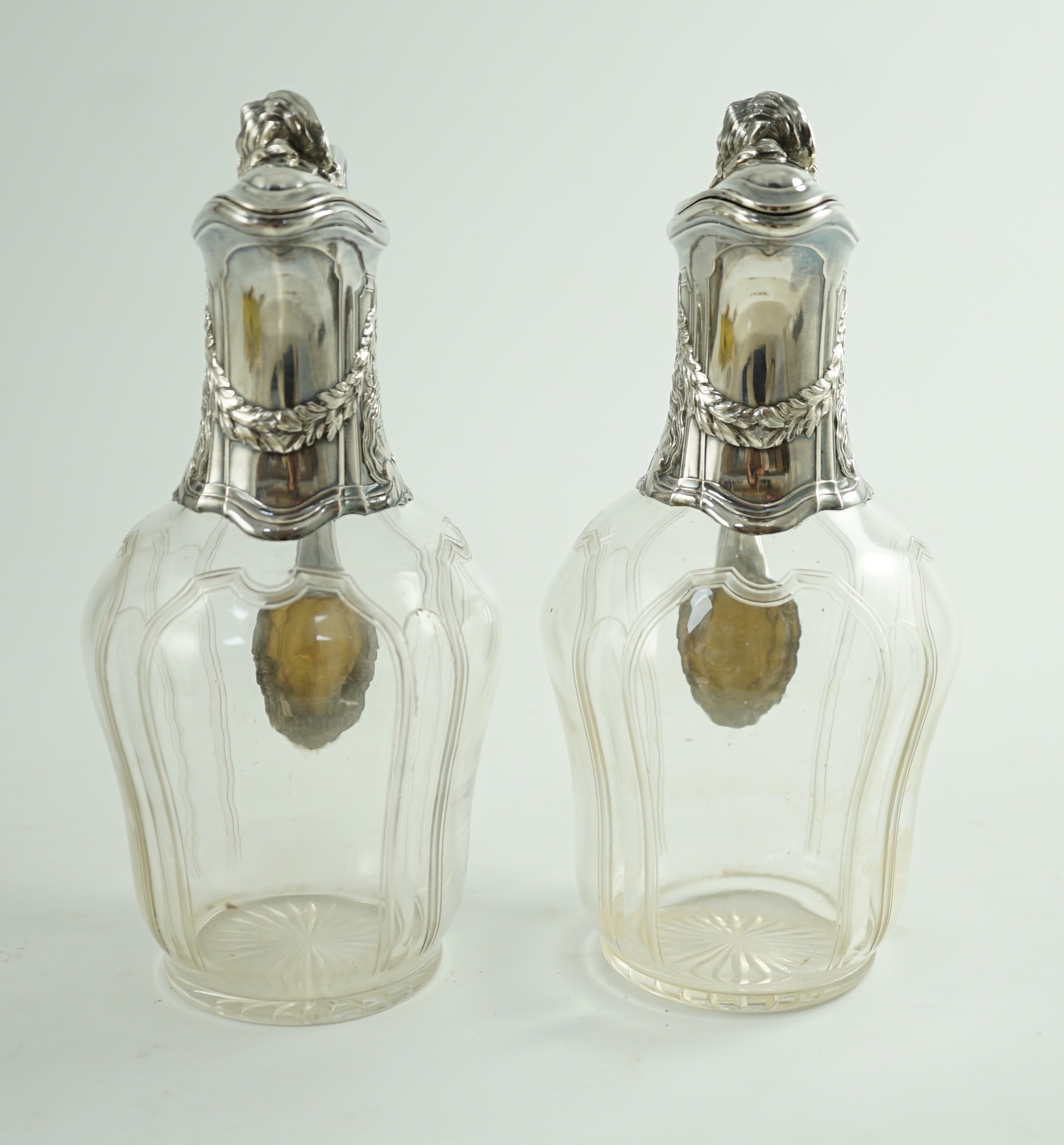 A pair of early 20th century French 950 standard silver mounted glass claret jugs, by Risler & Carre